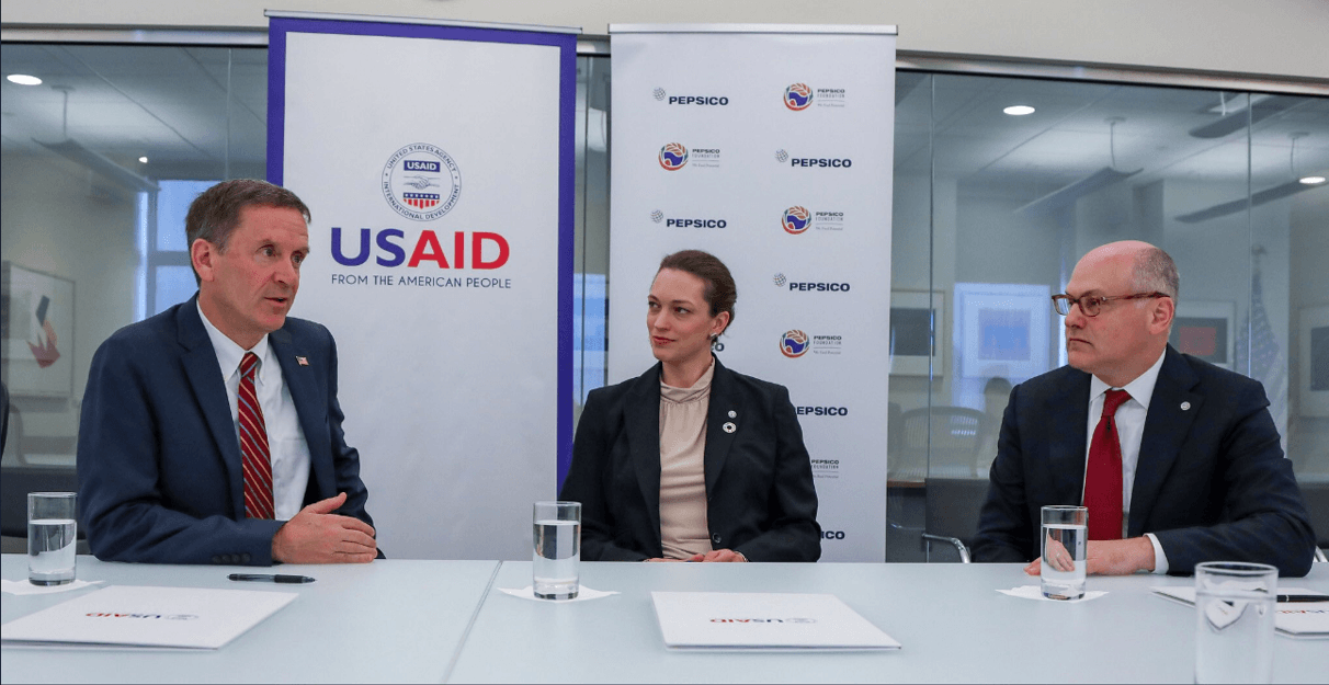 USAID Administrator Mark Green signs an agreement with PepsiCo that expands the Feed the Future initiative to combat global hunger.